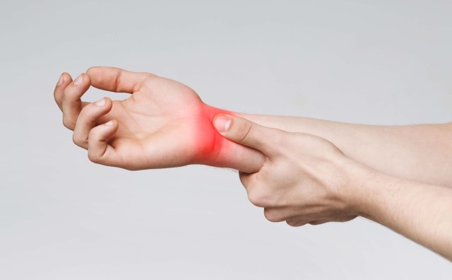Squeezing of the median nerve can result in carpal tunnel syndrome which may cause pain and tingling in the arm.